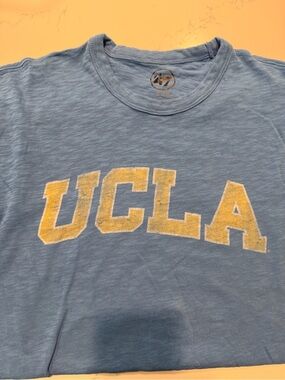 UCLA Vintage-Style Light Blue Graphic Tee. ‘47 brand